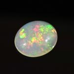 Кабошон из опала золотого овал 12*14мм