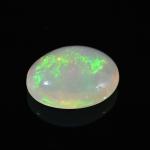 Кабошон из опала золотого овал 12*14мм