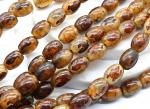 Бусина "Конь Тассо" из агата тибетского бочонок 10*14мм цвет кофейный, 33см, 25 бусин