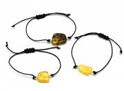 Браслет с Руной Эйваз из янтаря 10*17мм на шнурке цв.медово-молочный