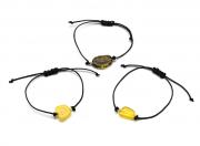 Браслет с Руной Уруз из янтаря 10*17мм на шнурке цв.медово-зеленый