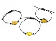 Руна Беркана браслете на шнурке с янтарем 10*17мм цв.медово-молочный