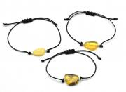 Руна Альгиз на шнурке с янтарем 10*17мм цв.медово-молочный